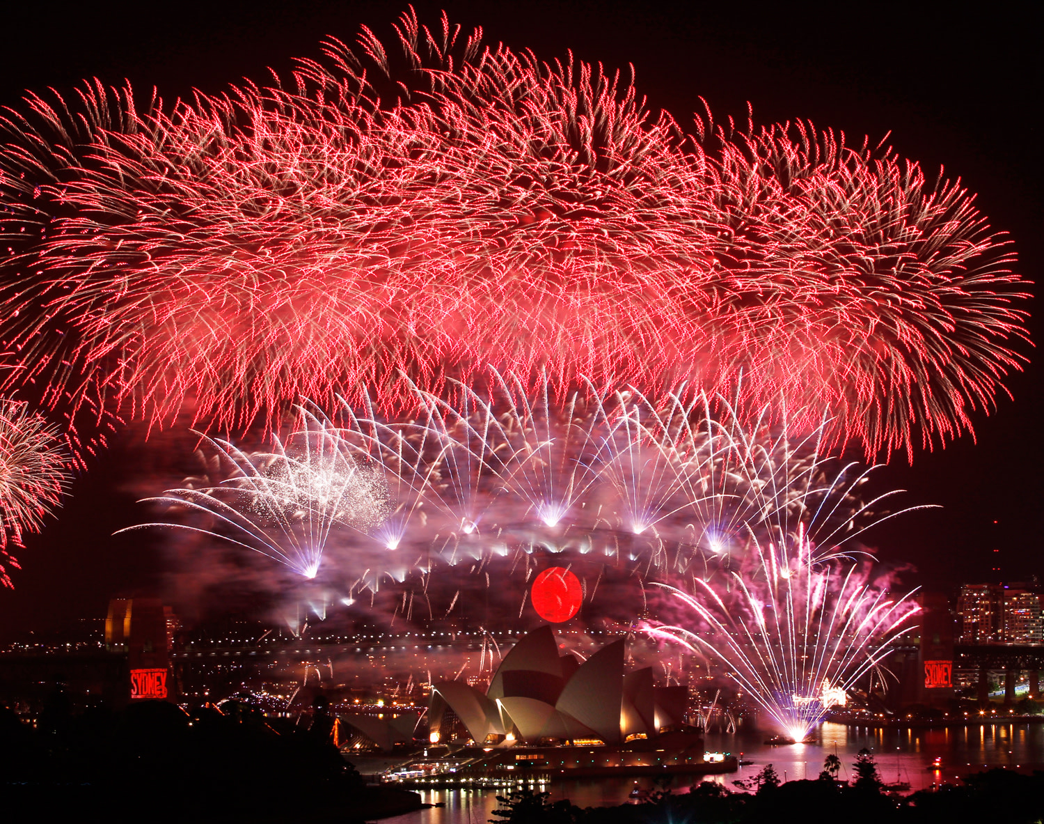 From dragon-shaped fireworks to prayers, globe greets 2011