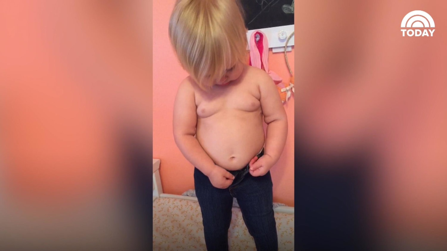 This toddler trying to squeeze into skinny jeans is all of us