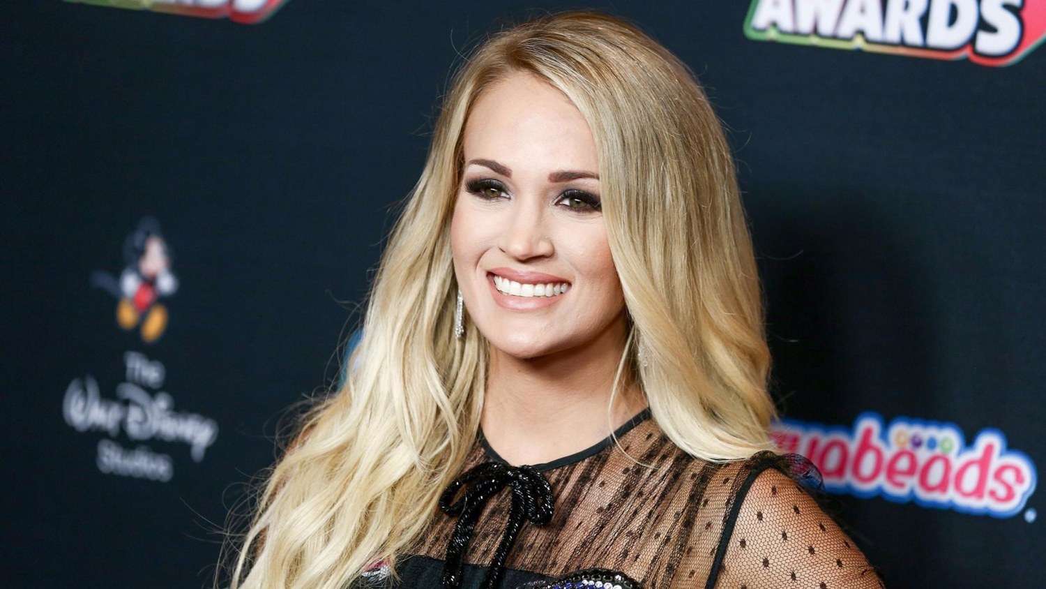 Carrie Underwood shares baby bump pic from American Music Awards rehearsal
