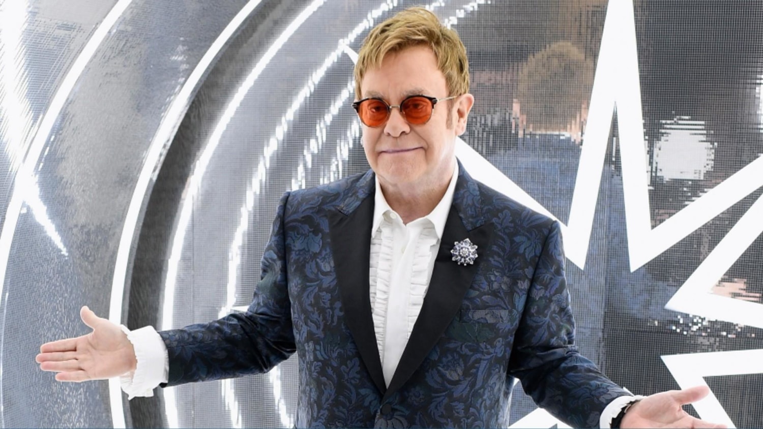 Elton John gets legendary sequined Dodgers uniform back from the