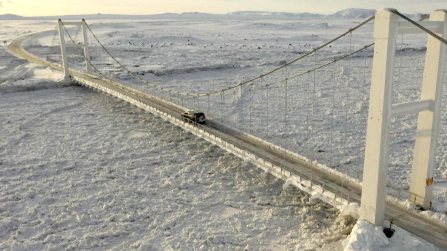 Icebound river threatens highway, bridge in Iceland
