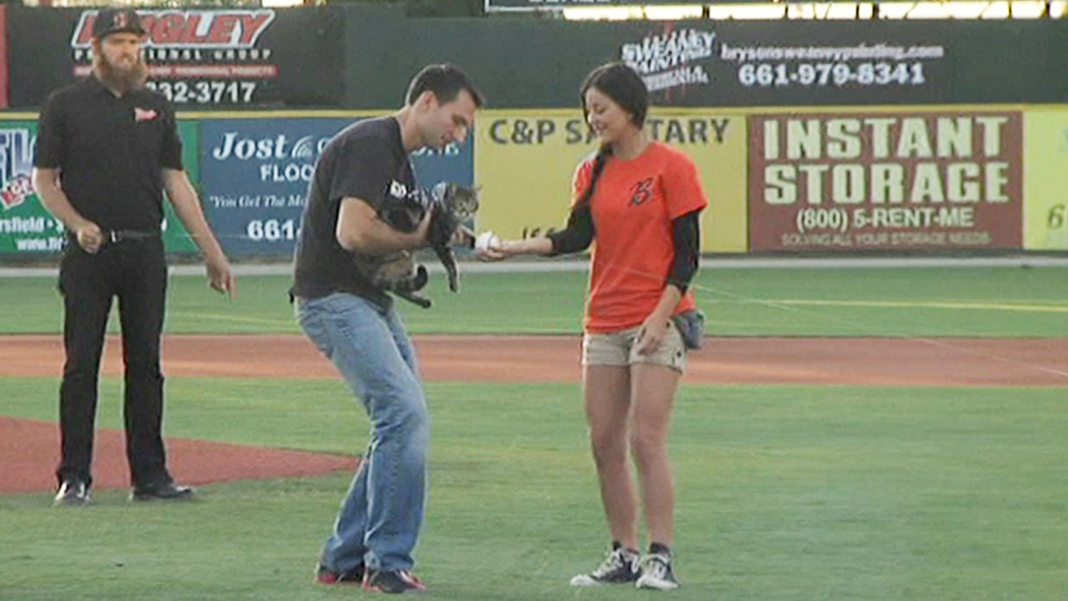 Hello Kitty throws the ceremonial first pitch before a baseball