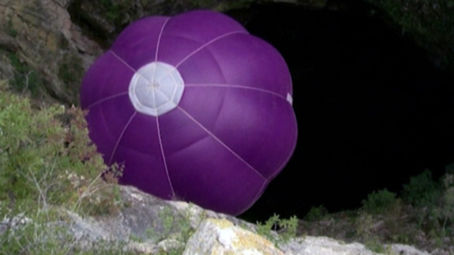 Watch Man Pilot Hot Air Balloon Into Underground Cave