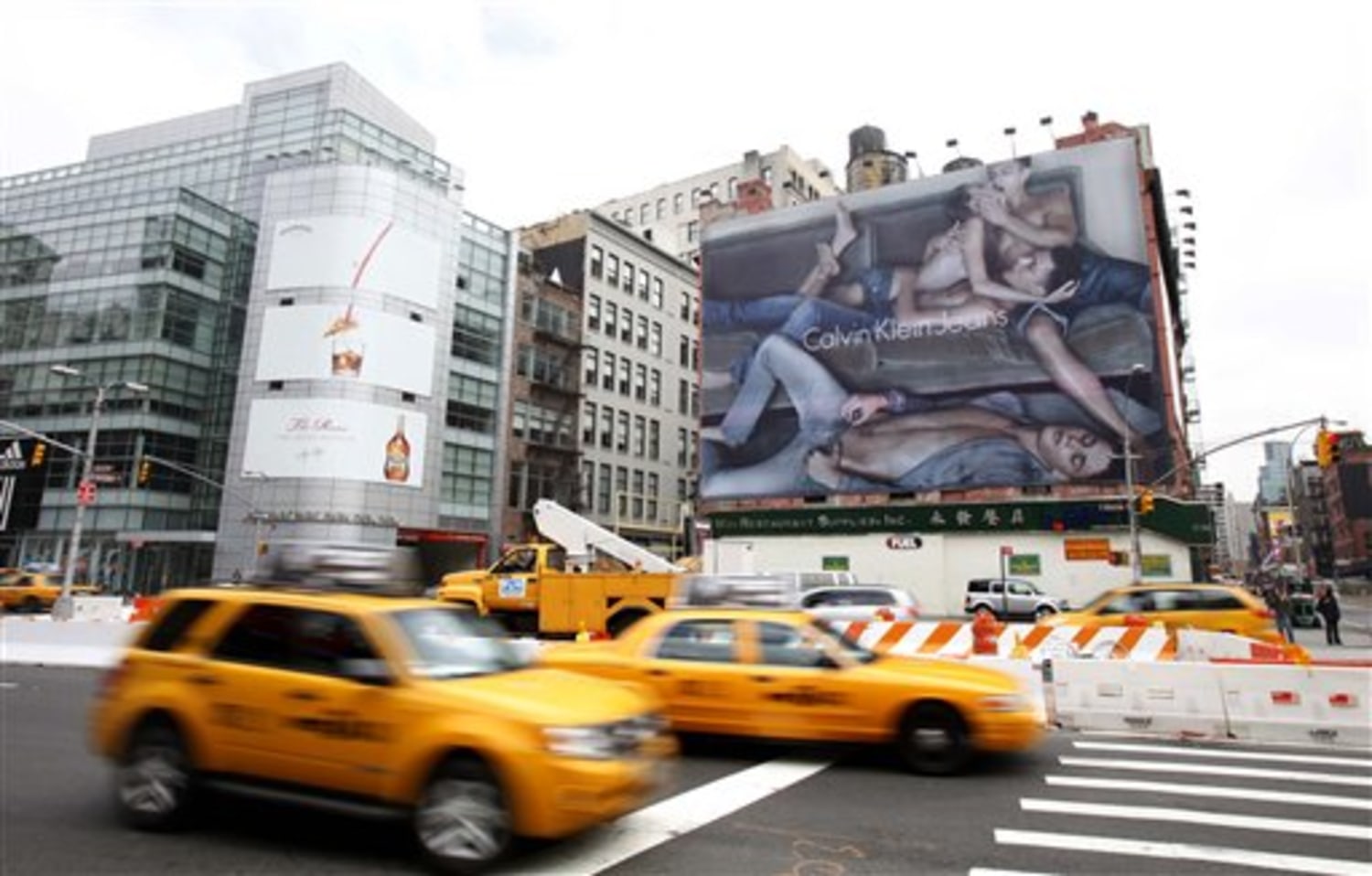 Three's company in racy Calvin Klein billboard