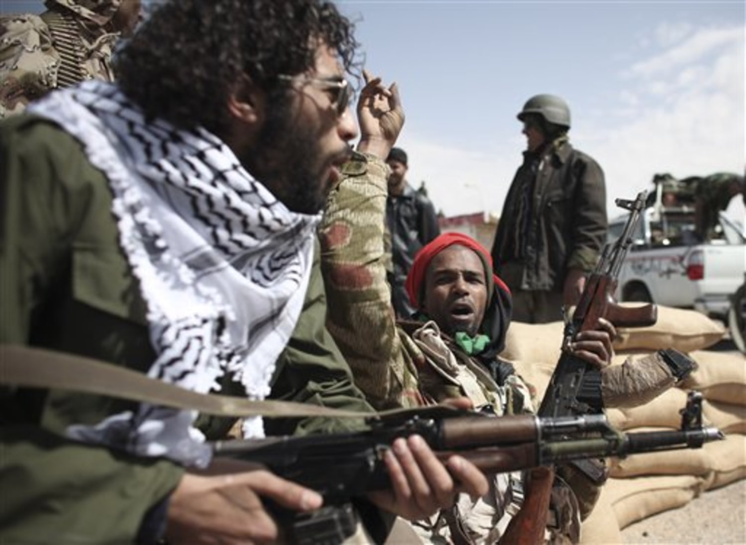 Rebels reinforce key Libyan oil in east
