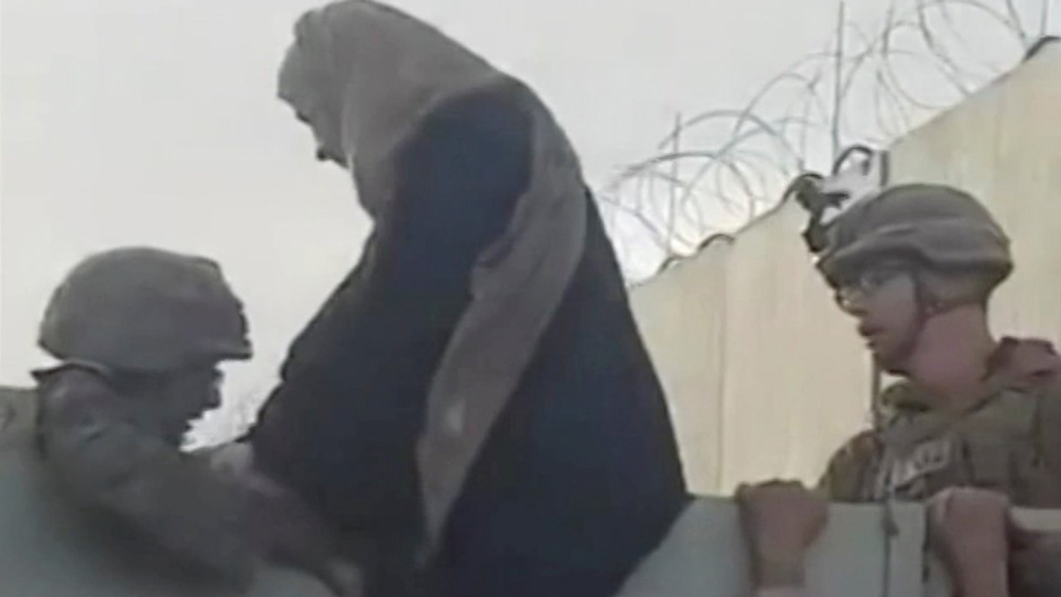 1500px x 844px - Videos show American soldiers help woman, child over wall at Kabul airport
