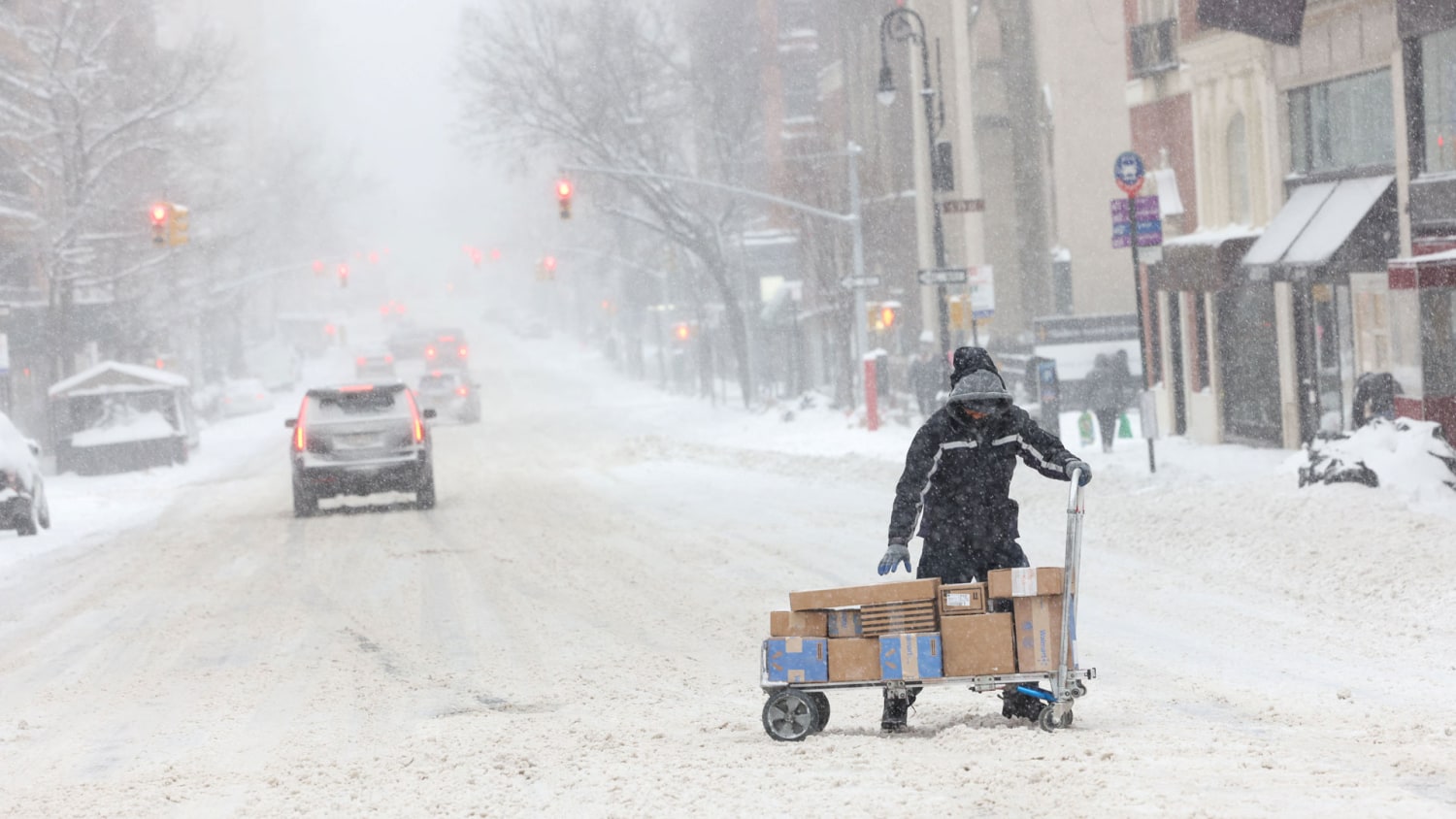 Heavy snow has left thousands without power in New England and New York 