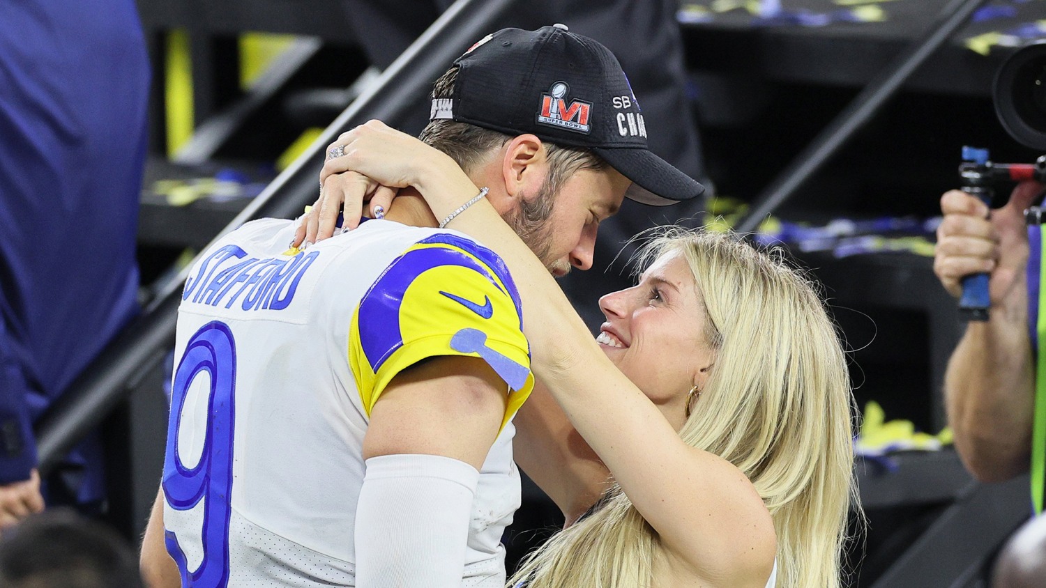 Matthew Stafford turns away as Rams parade photographer falls