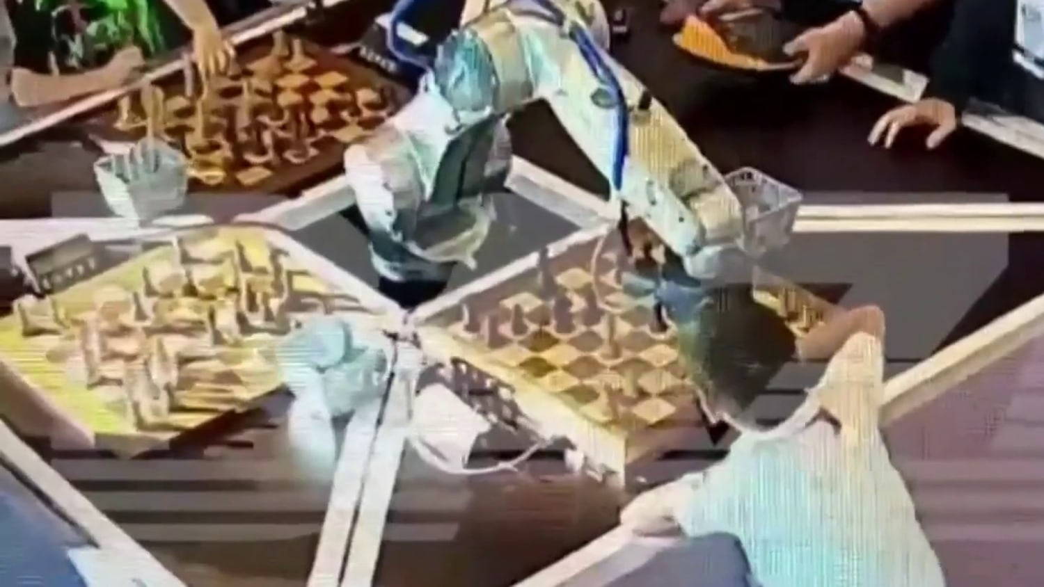 Chess robot breaks finger