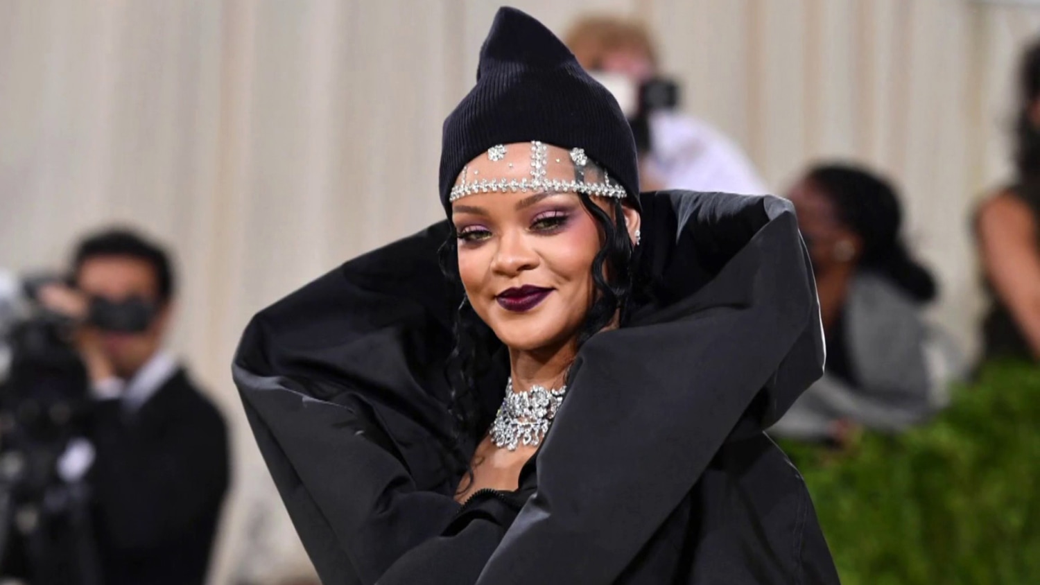 Pregnant Rihanna showcases her growing baby bump in lingerie to