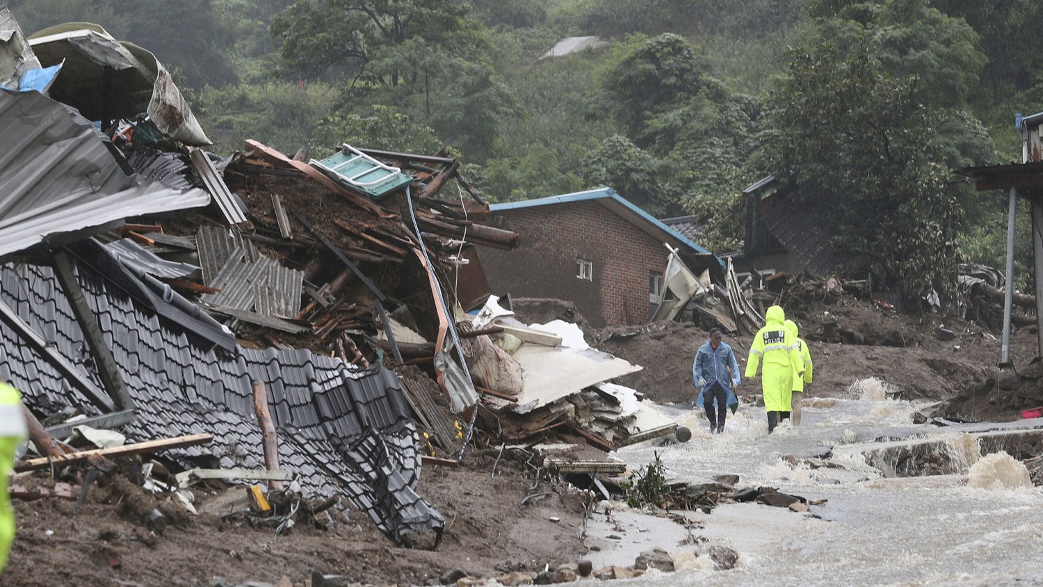 Landslides and floods kill at least 33 as South Korea is battered by  torrential rains