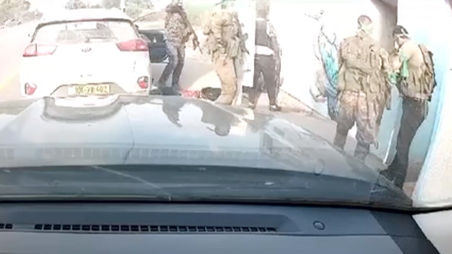 Dashcam video shows Hamas gunmen toss grenade into bomb shelter