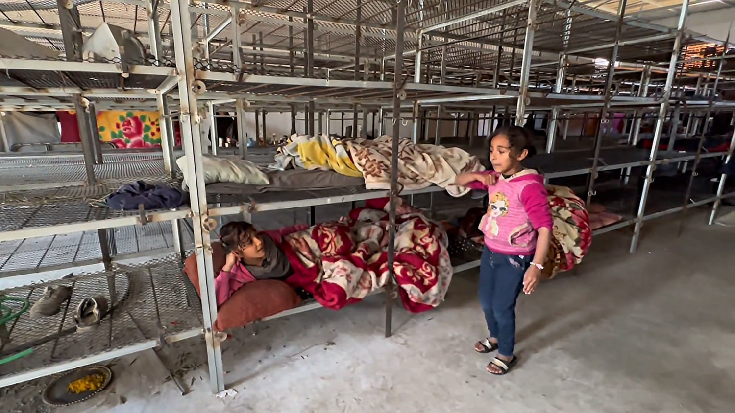 Displaced families in Gaza living in a chicken coop for safety