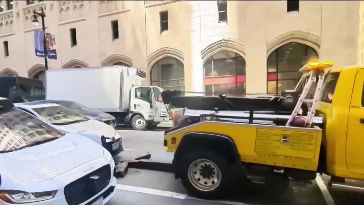 Video shows truck trying to tow car with driver inside – NBC News