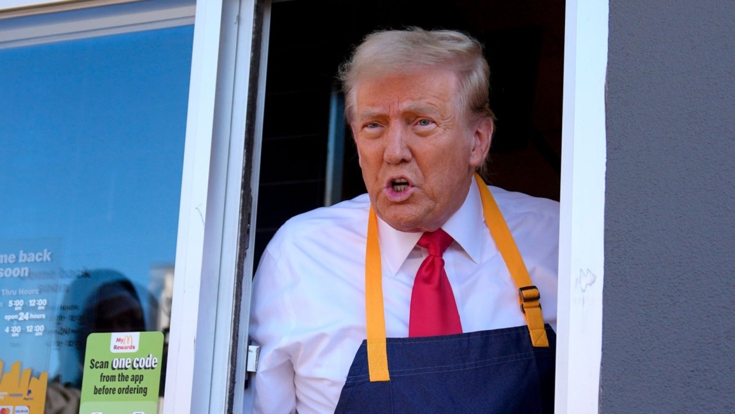 Trump works fryer at Pennsylvania McDonald's