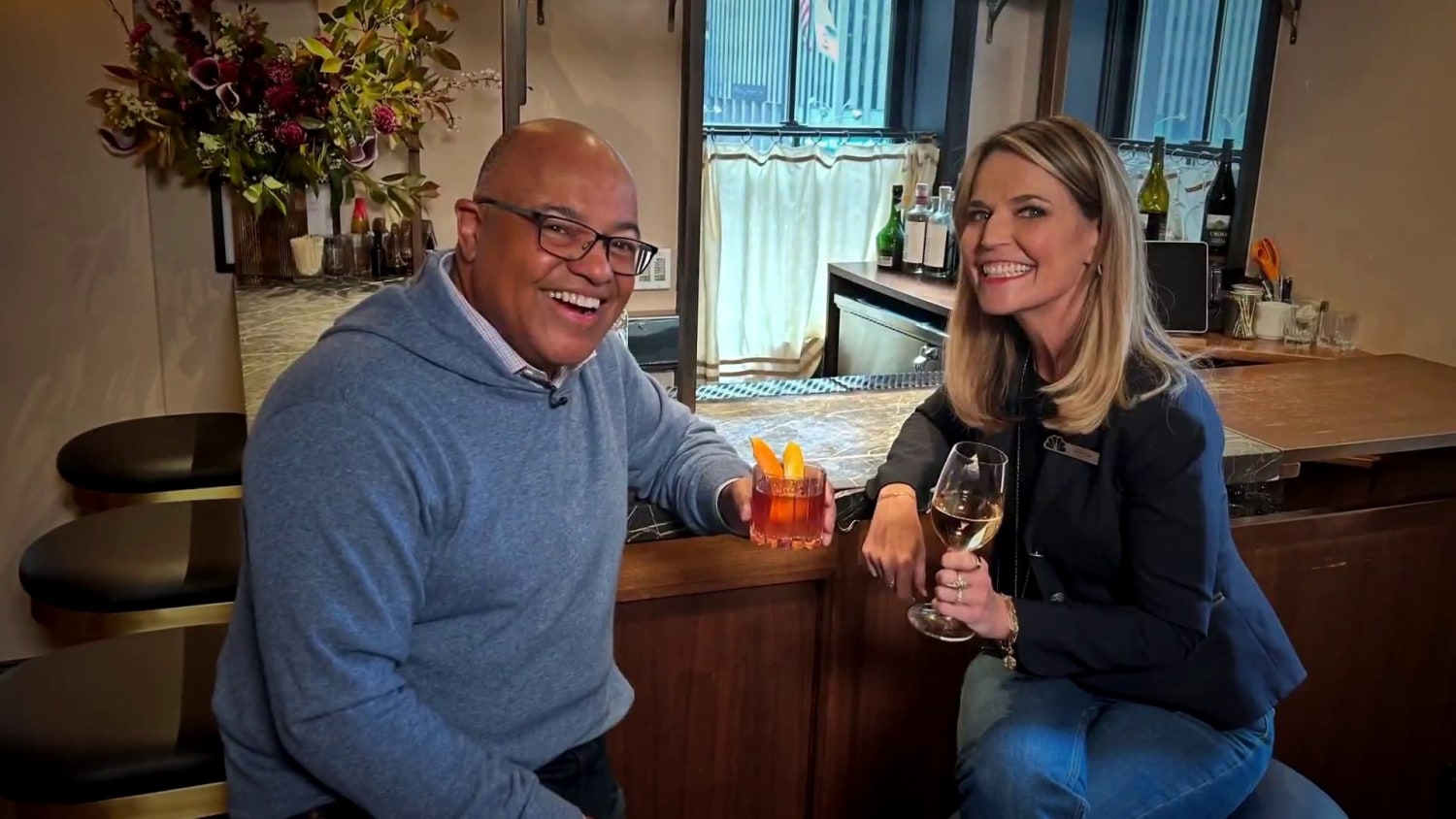 Savannah Guthrie gives Mike Tirico a tour around Rock Center