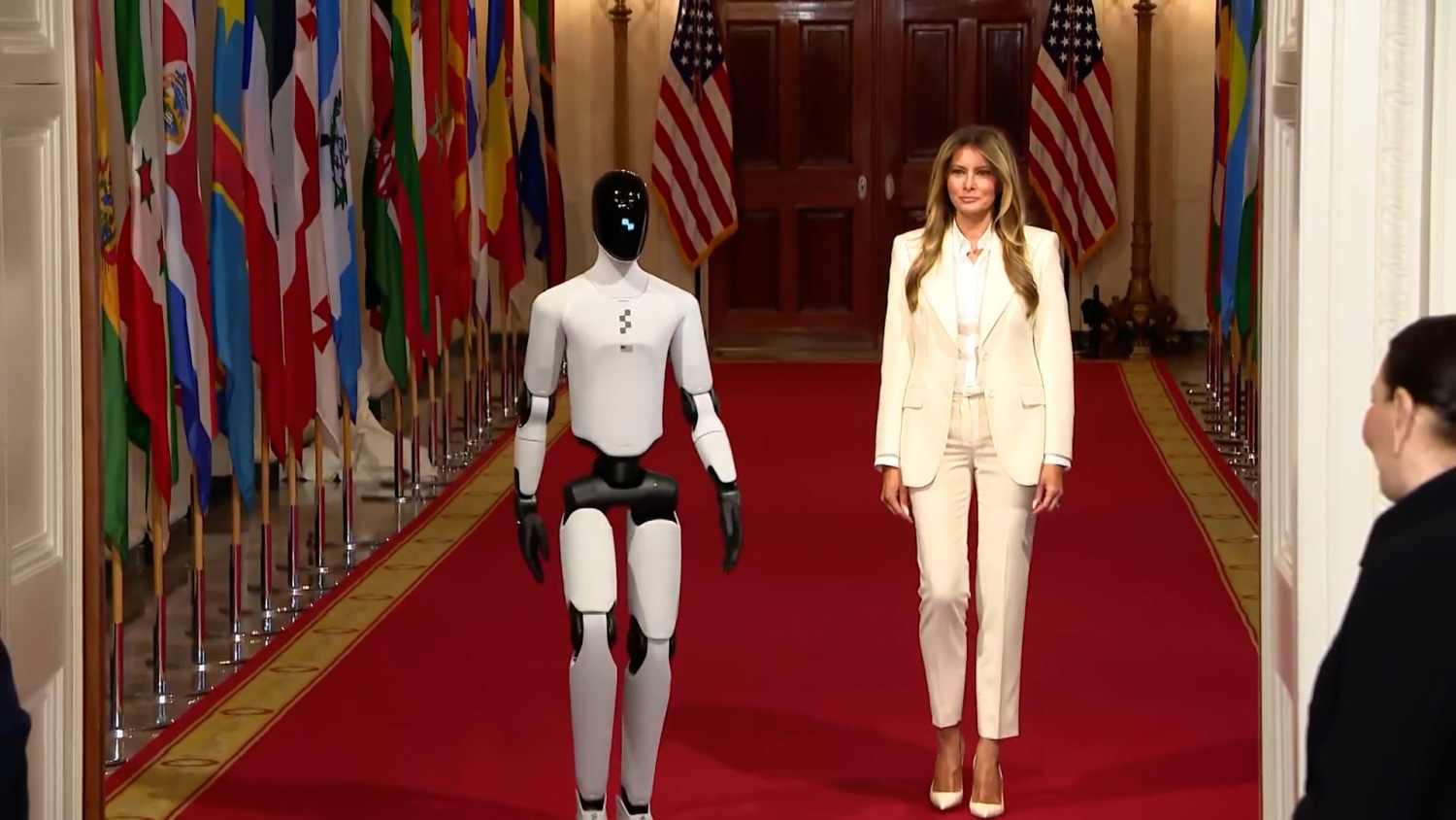 nbcnews.com - Melania Trump walks side by side with humanoid robot at White House summit