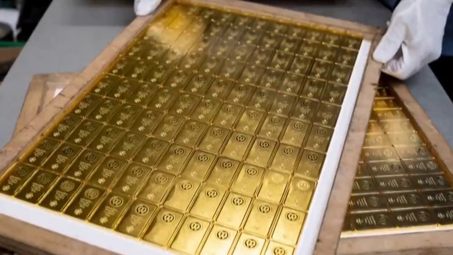 Former CIA officer accused of stashing 300 gold bars in his house