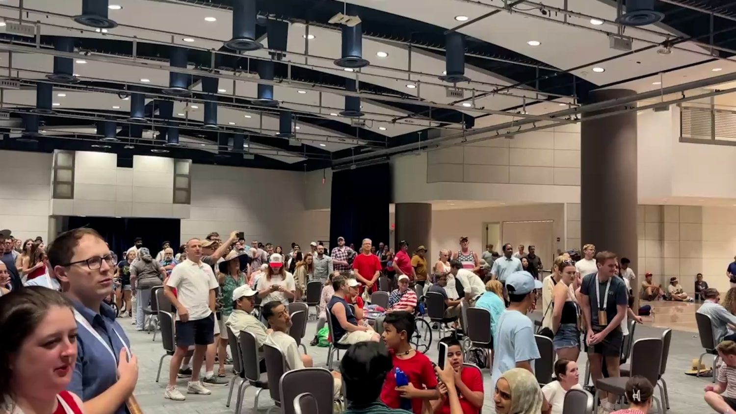 Watch: Salute to America event evacuees sing National Anthem