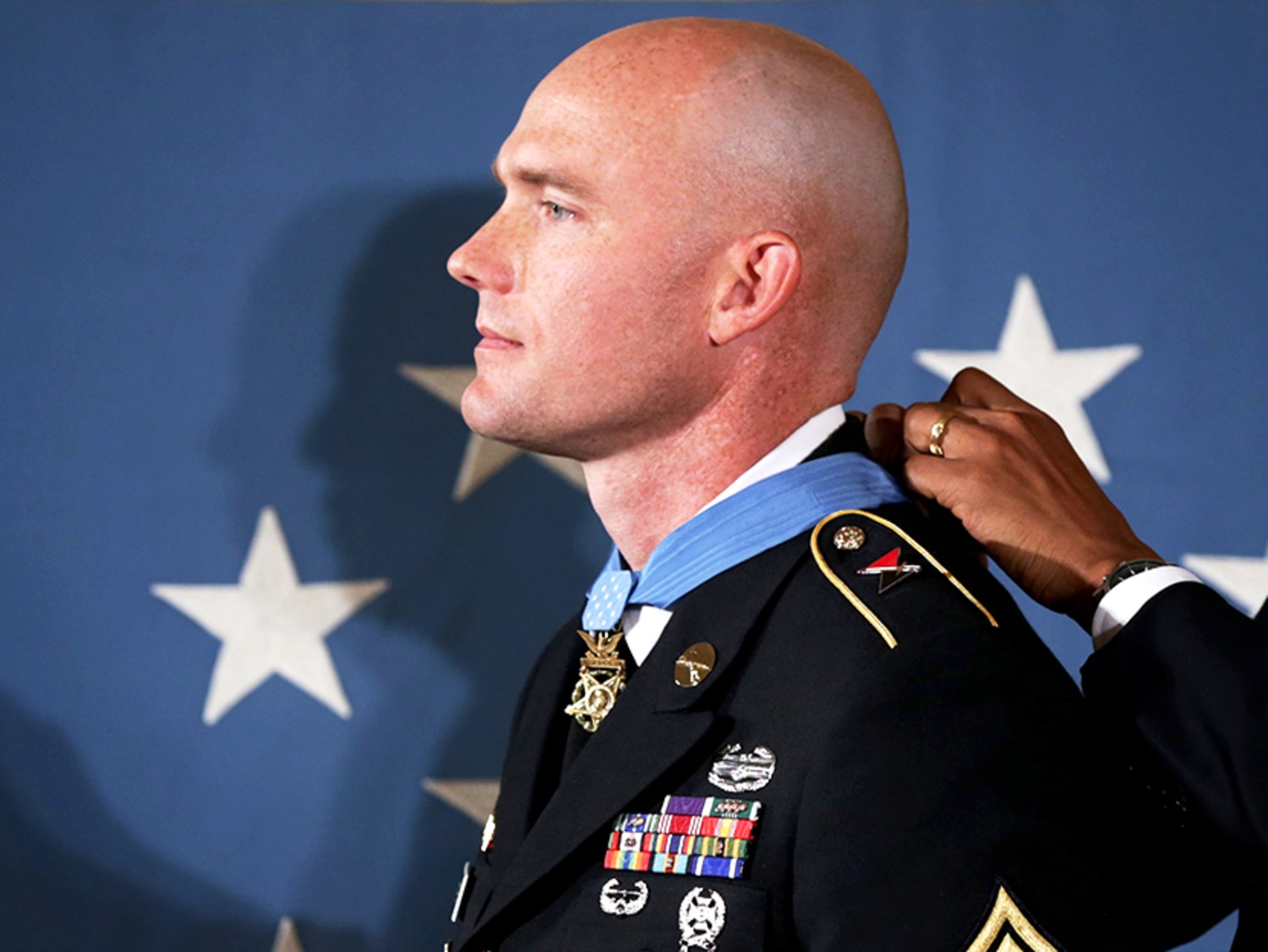 Soldier honored for bravery in Taliban firefight