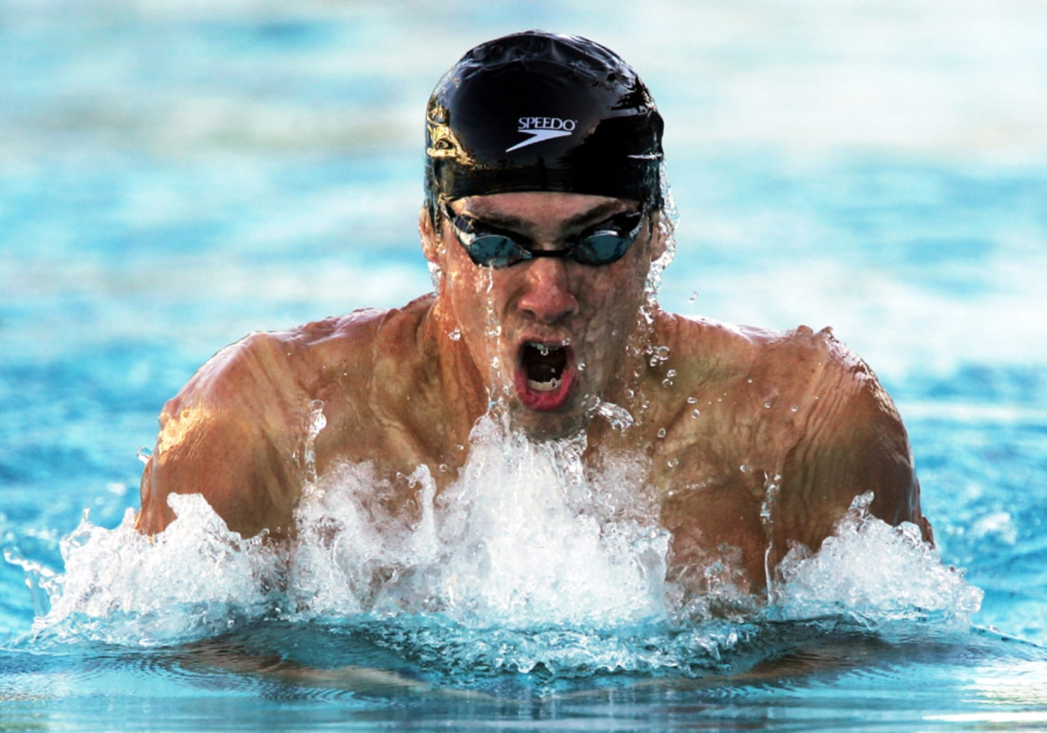 Father figure coach gets most out of Phelps