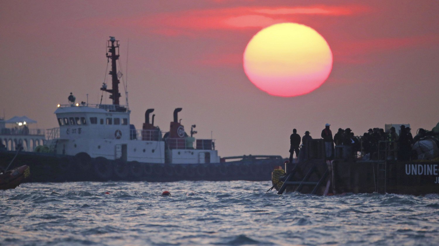 Overloaded South Korean Ferry Sunken 3 Years Ago Emerges In Grey Sea