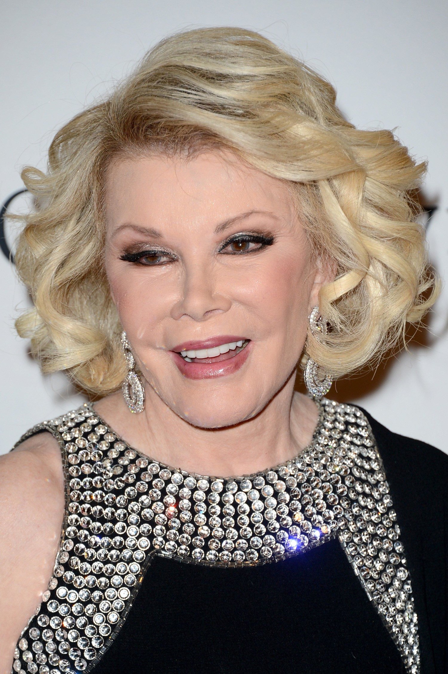 Family of Joan Rivers reaches settlement with clinic