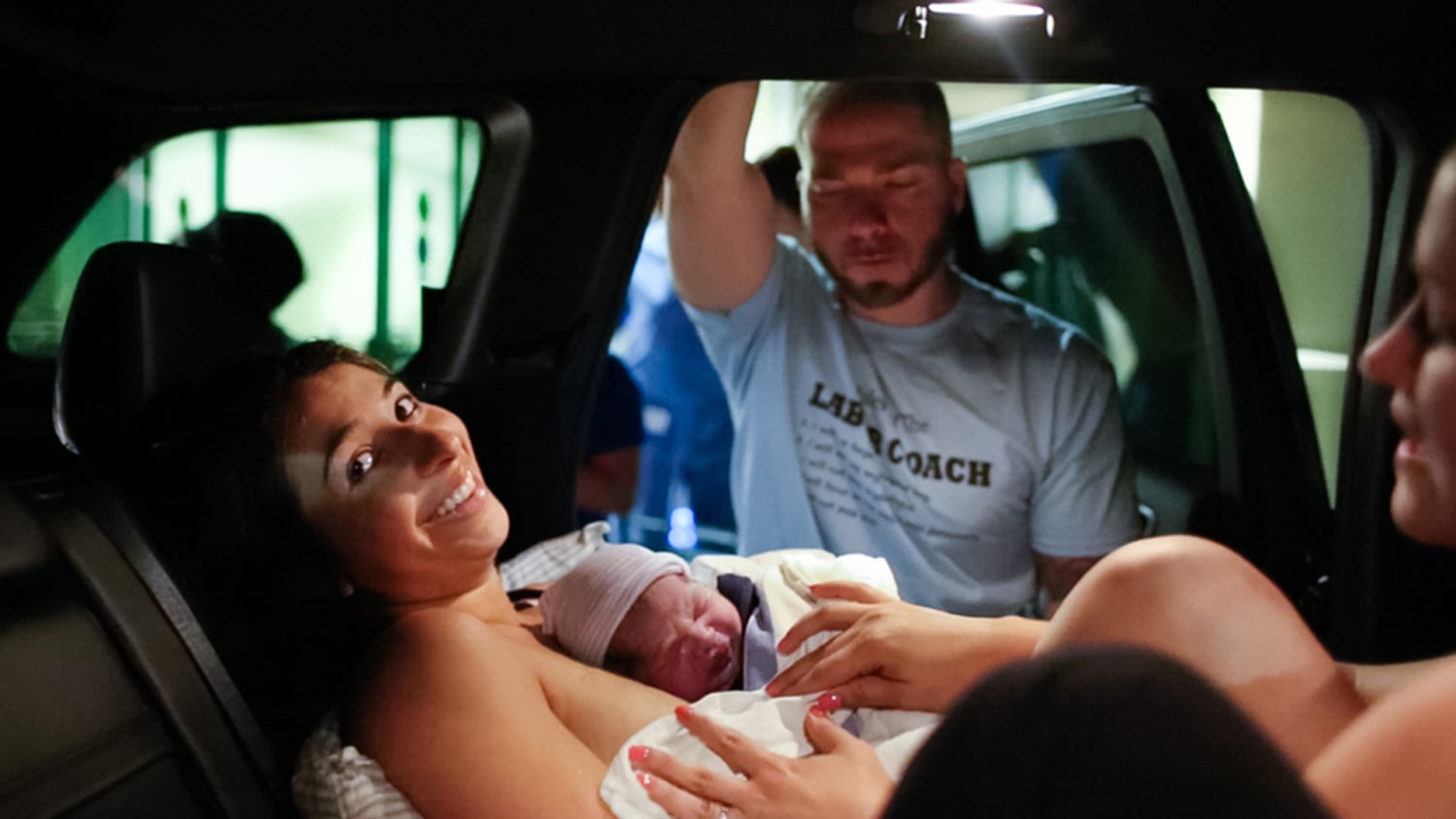 Photos show Florida mom giving birth in hospital parking lot