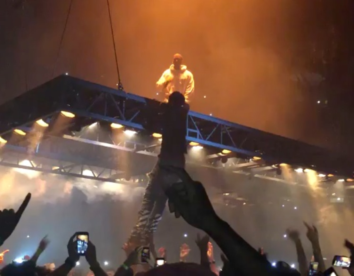 Man Tries to Board Kanye West's Stage at Concert