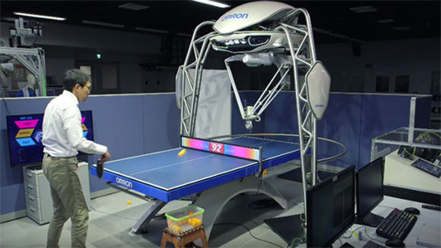 Man playing table tennis with robot auto, Stock Video