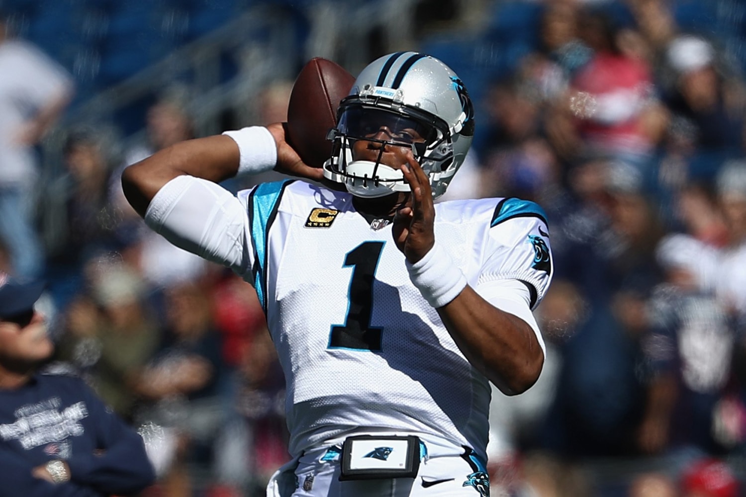 Cam Newton of the Carolina Panthers warms up before playing the New