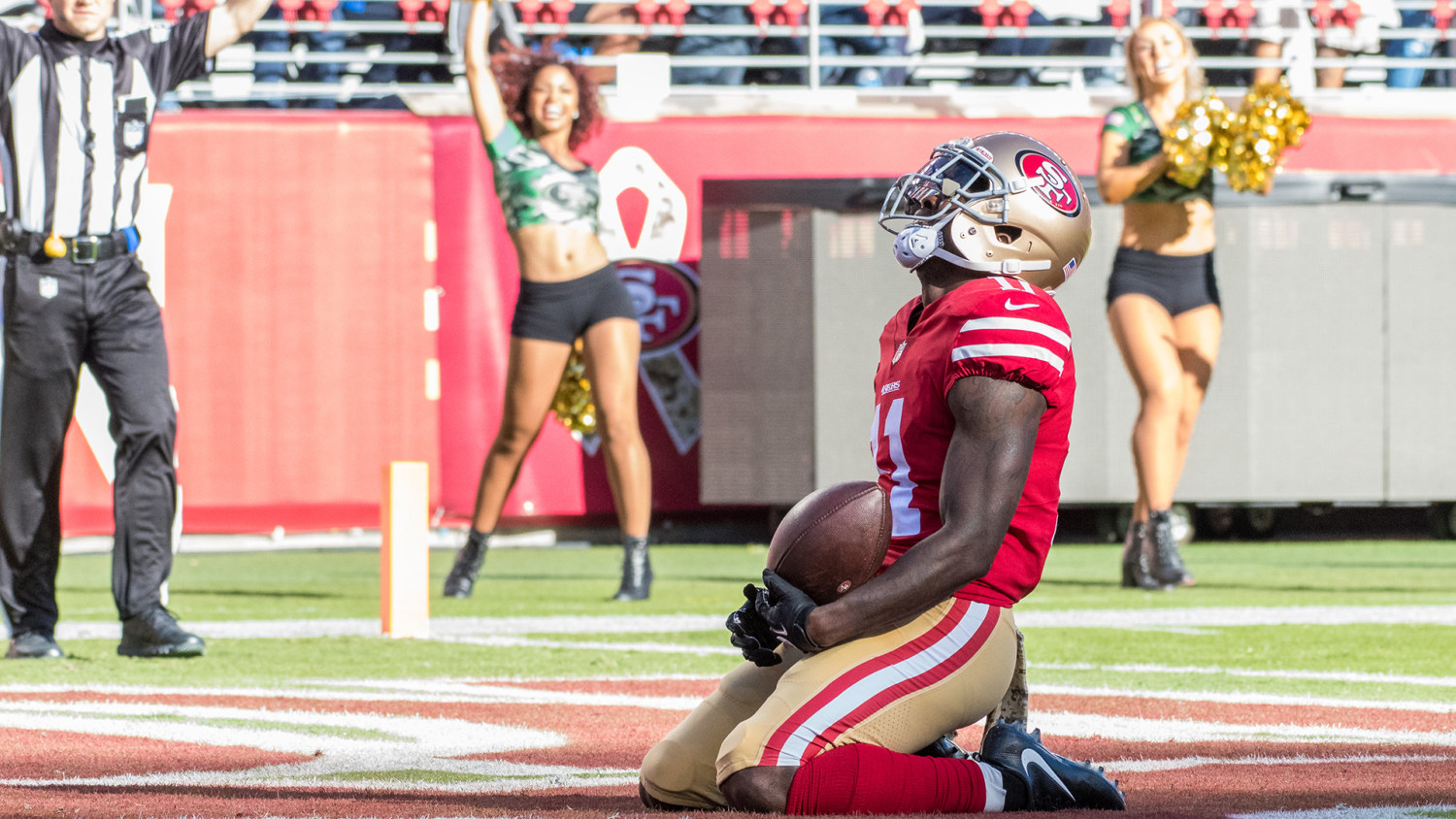 After losing baby, NFL star Marquise Goodwin delivers again in wake of  father's death - CBS News