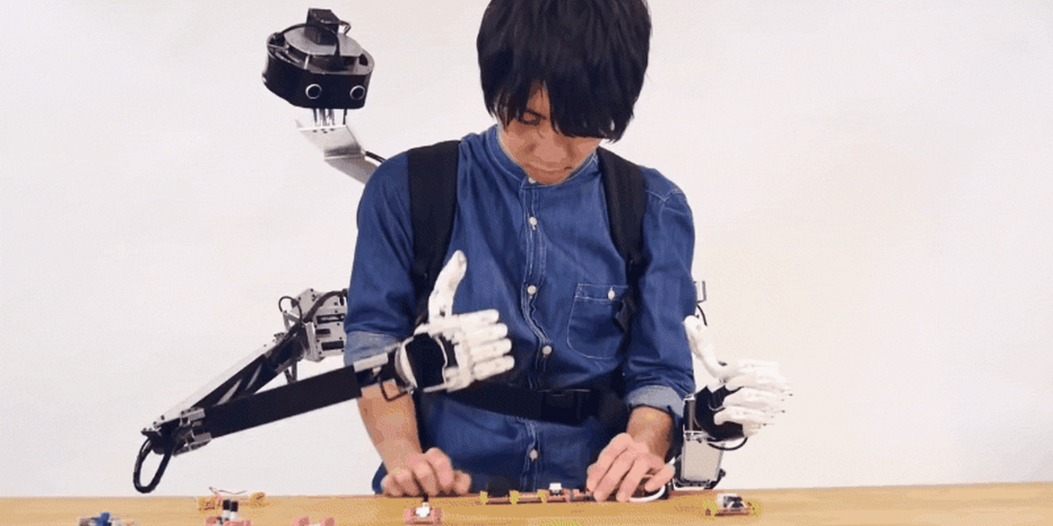 Robotic head and arms let two people share one body