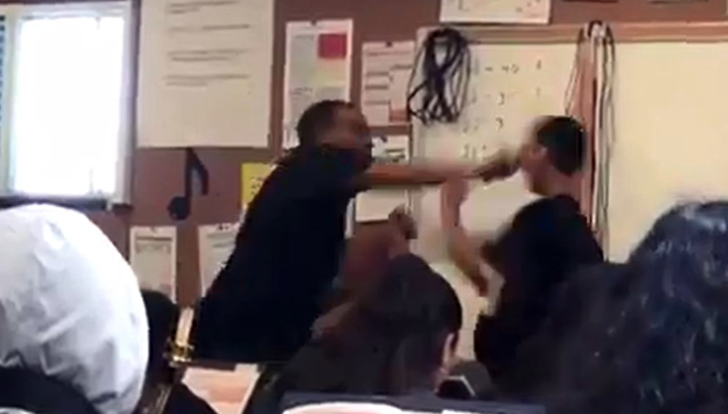 Charge dropped against teacher seen on video punching student who 