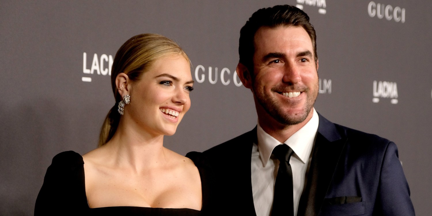Kate Upton plants a kiss on husband Justin Verlander then he snuggles up to  daughter Genevieve