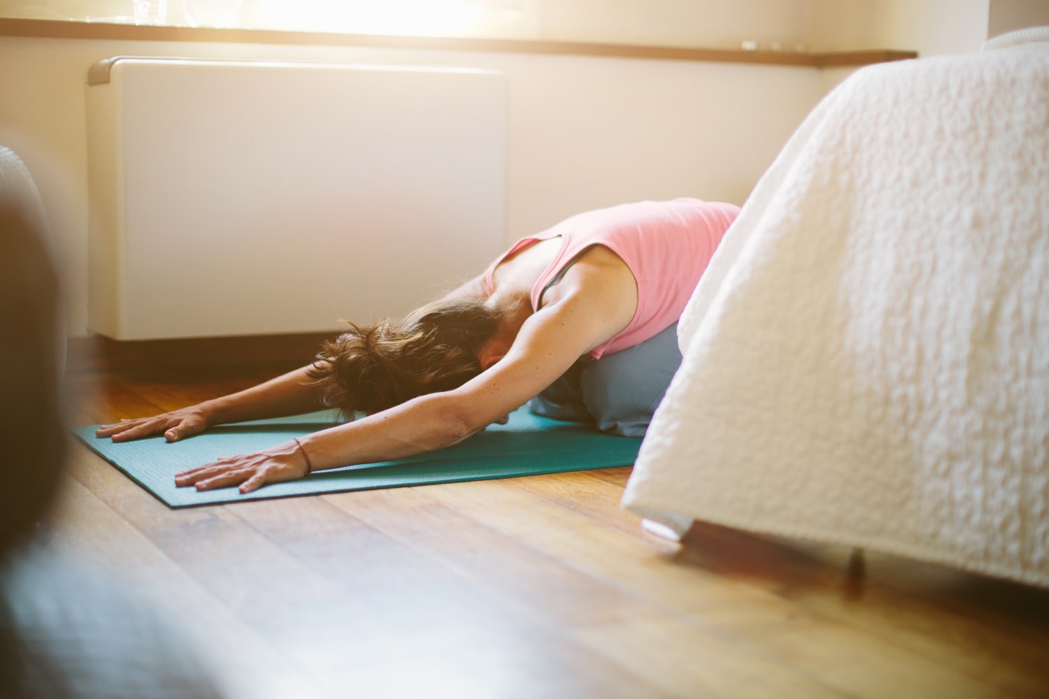 8 Yoga Poses You Can Do In Bed Before You Sleep - DoYou