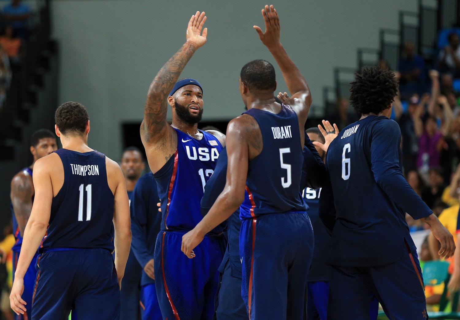 Kevin Durant giving away true height by standing next to DeMarcus Cousins, Sporting News