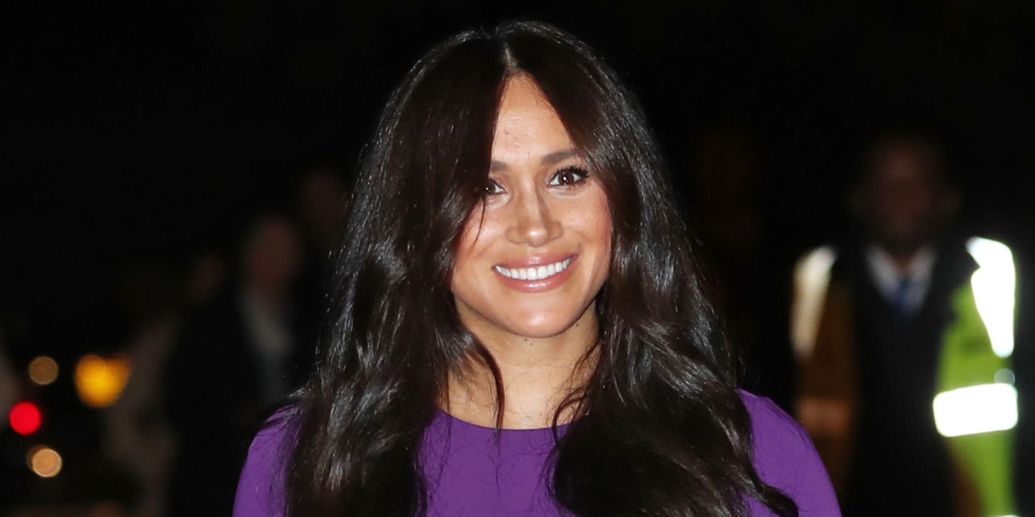 meghan pregnant purple dress Meghan Markle Recycles Purple Maternity Dress