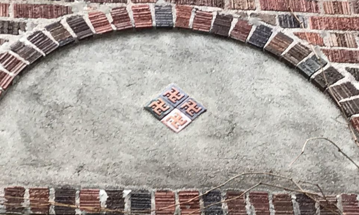 University of Montana council urges removal of swastika-like symbol