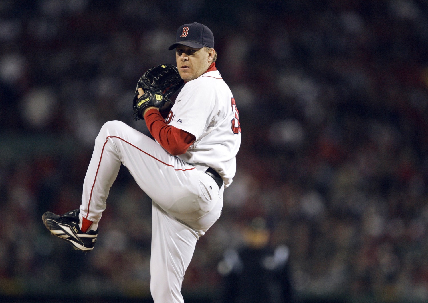 Curt Schilling of the Boston Red Sox celebrates after defeating