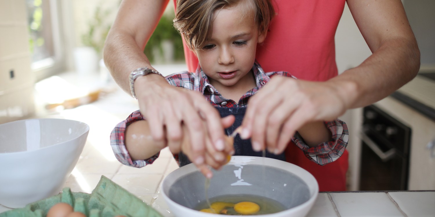 Premium Photo  A funny cute toddler mixing ingredients using blender  helping father a kid learning to cook