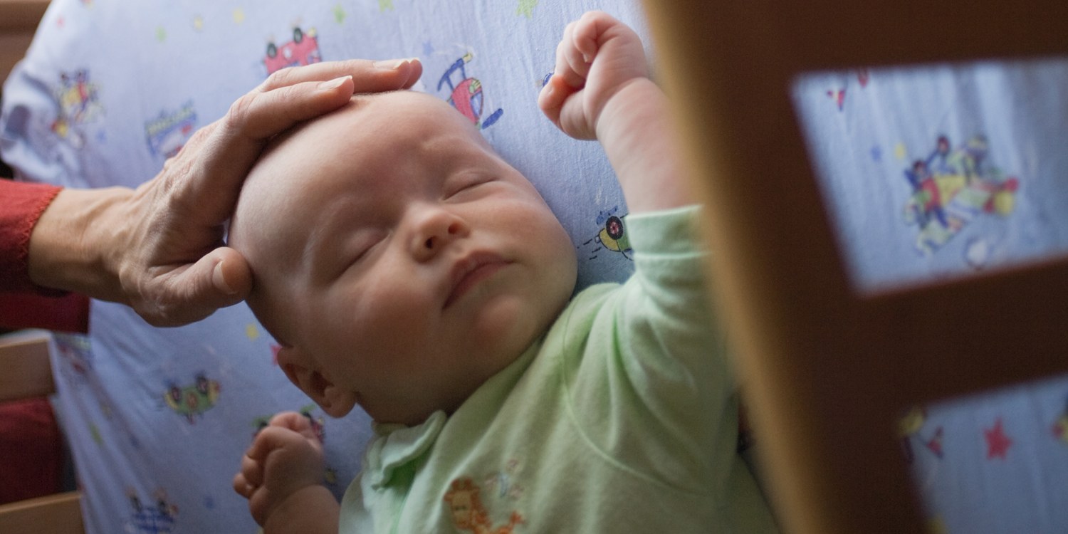 Babies Sleeping On The Side: What Happens If They Do & How To Stop It