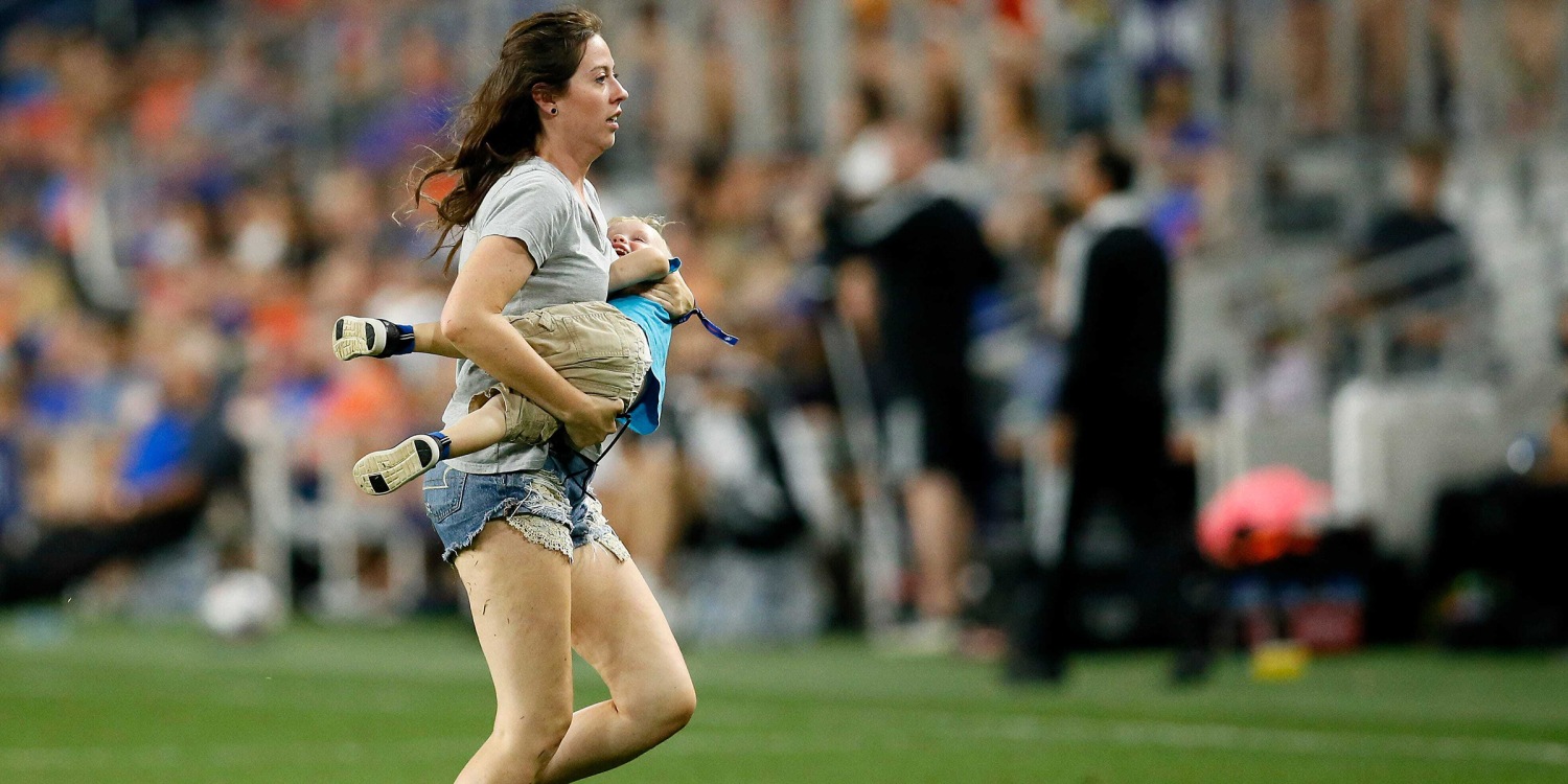 Mom rescues 2-yr-old who ran onto field at pro soccer game - Upworthy