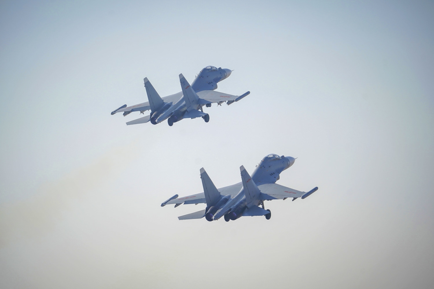 Taiwan 'on alert' after record 56 Chinese warplanes enter its air defense  zone