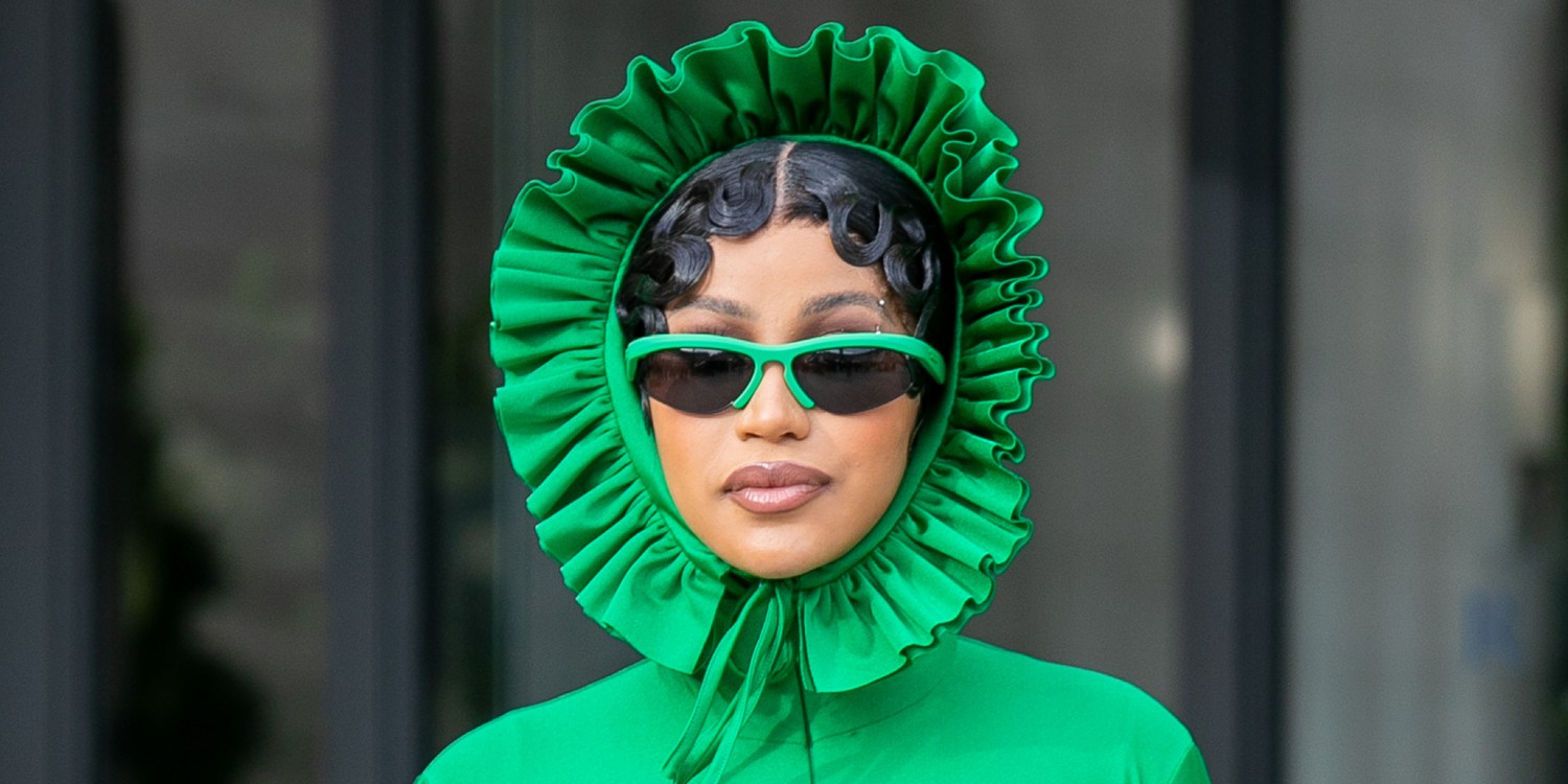 Cardi B Wears an All-Black and Green Look With Oversized Hoops Earrings