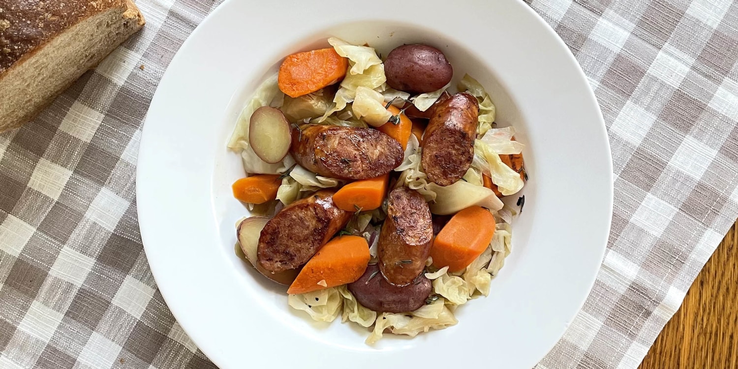 https://media-cldnry.s-nbcnews.com/image/upload/t_fit-1500w,f_auto,q_auto:best/newscms/2023_38/2032146/slow-cooker-sausage-cabbage-mc-2x1-230920.jpg