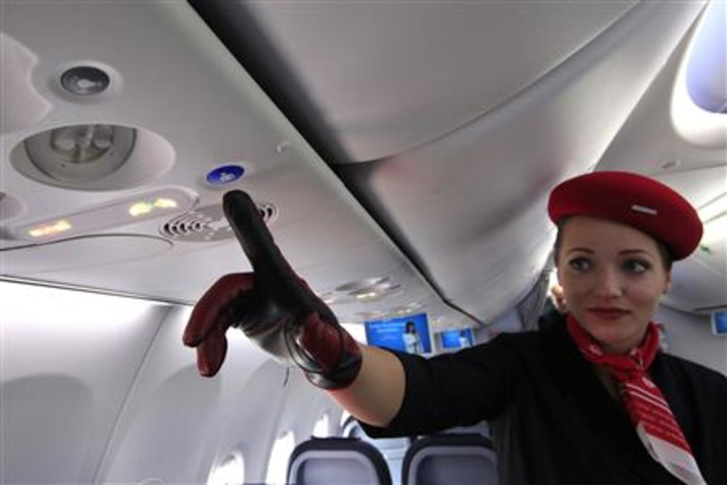 Flight Attendant Call Button: When Should You Use It? - One Mile