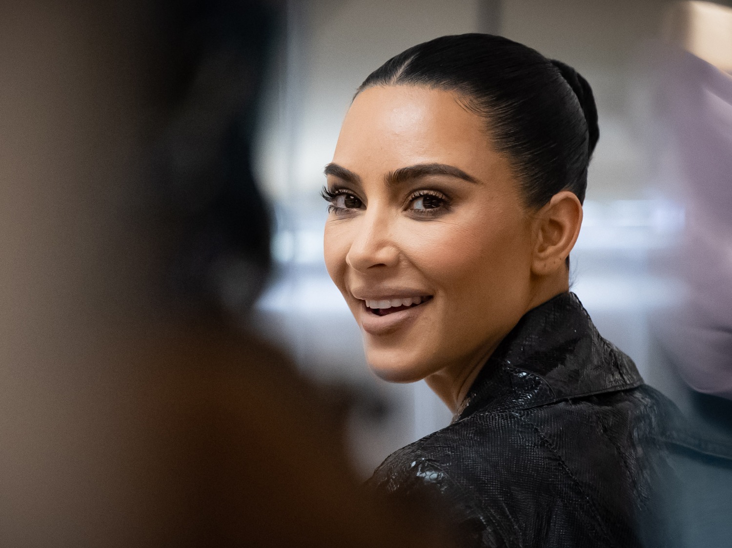 Kim Kardashian told women to 'get ... up and work.' Some people are saying  it's hypocritical.
