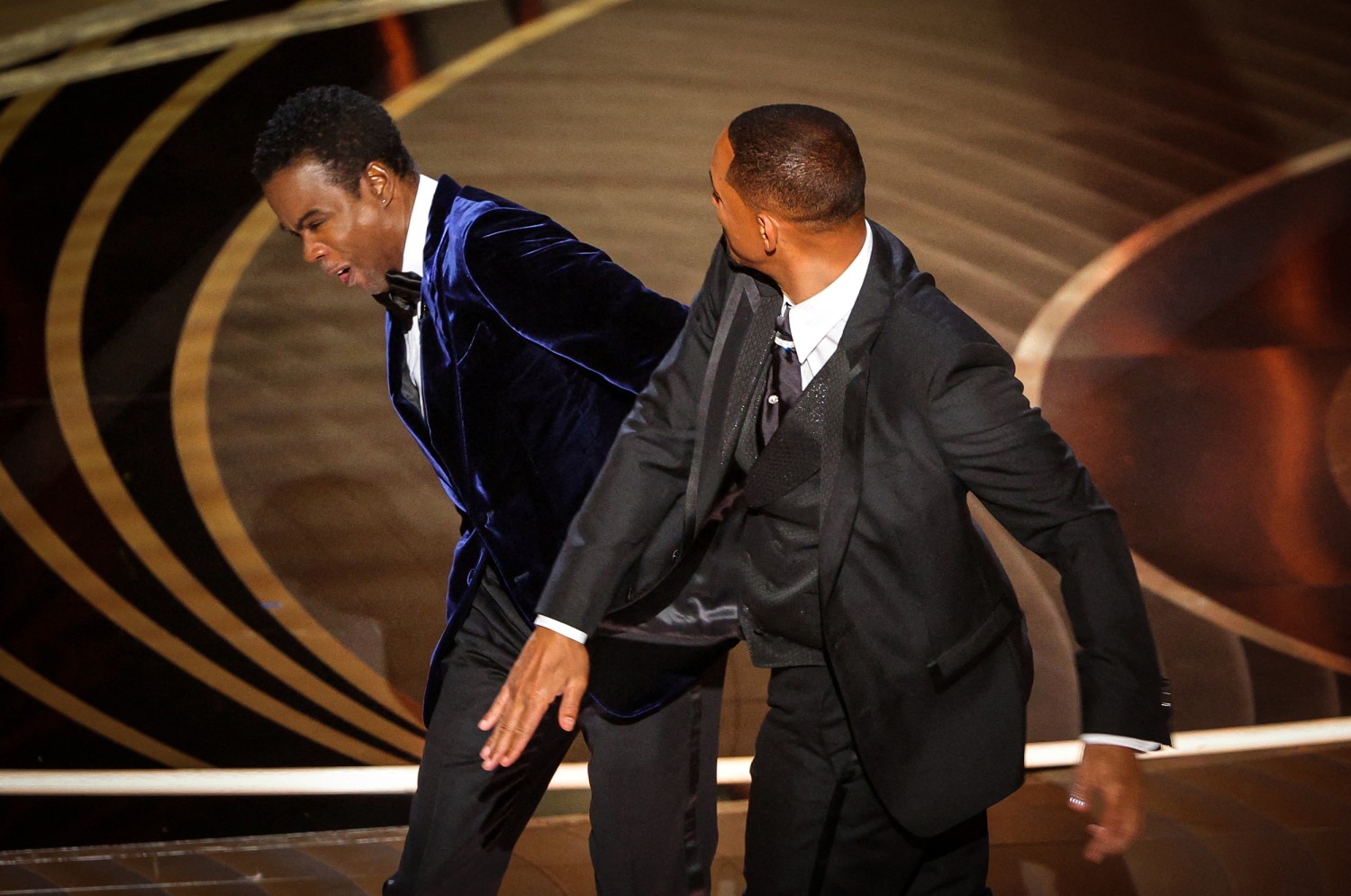 Watch: Will Smith hits Chris Rock at the Oscars, apologizes during speech