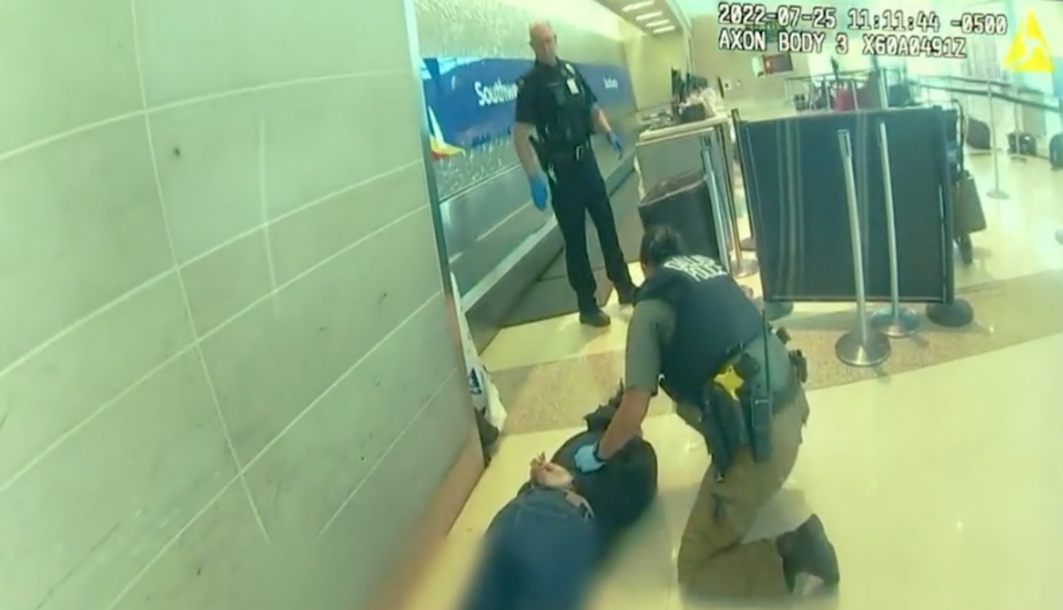 Police release video of officer shooting a woman who fired a gun at Dallas  Love Field airport